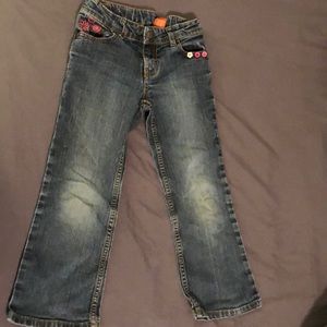 Jeans with floral embellished pockets